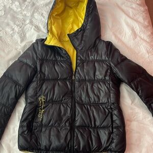 Black/Yellow reversible winter puffer from buckaroo jeans modern vintage.